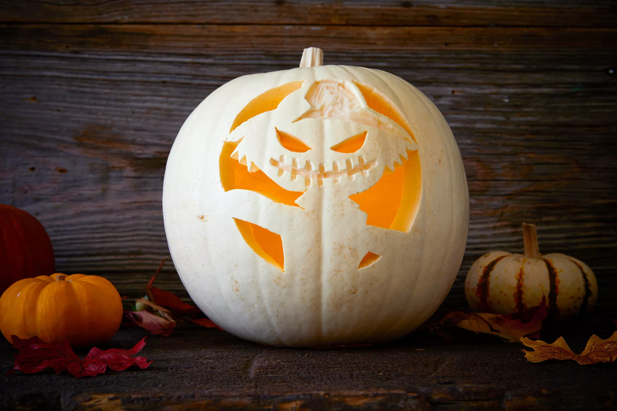 carved pumpkin gremlin with hat