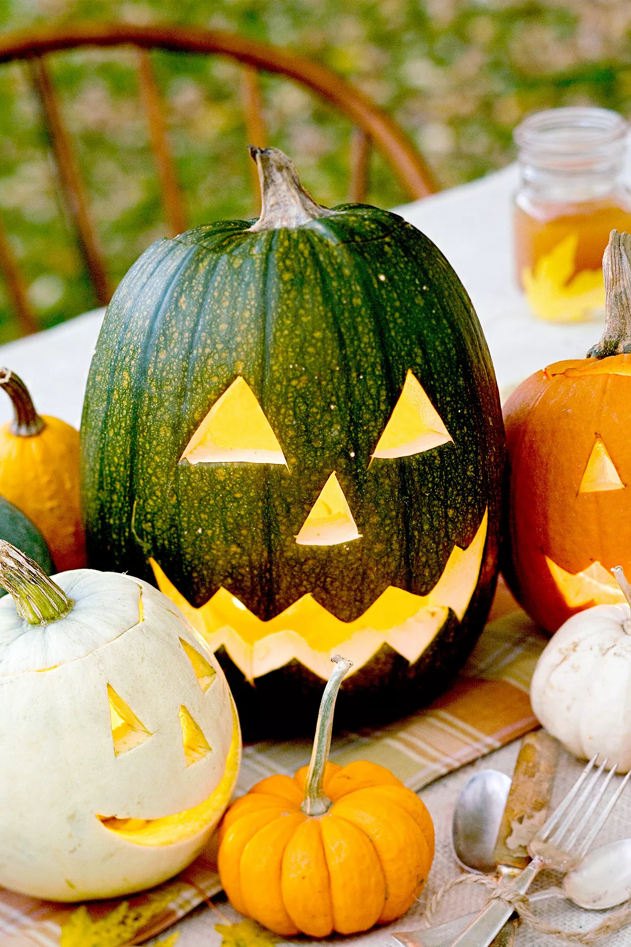Carved pumpkins sitting on table