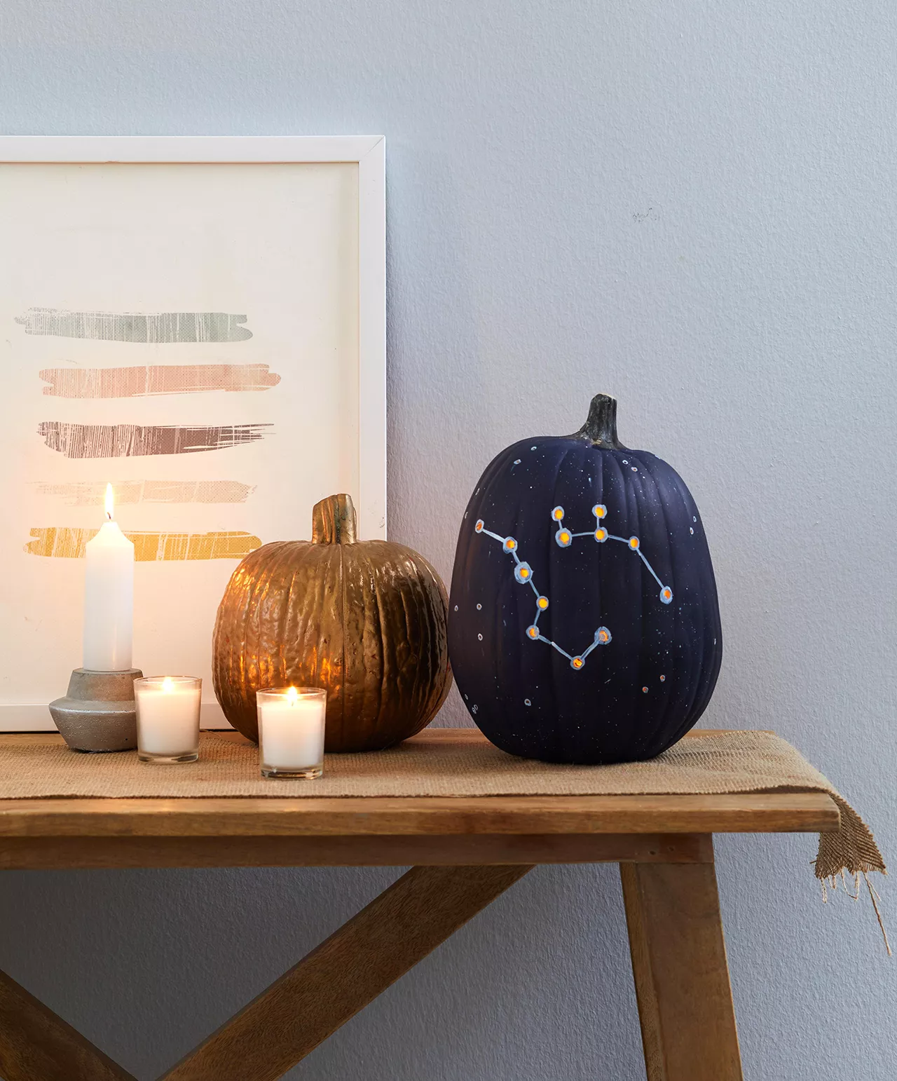 constellation painted pumpkin display