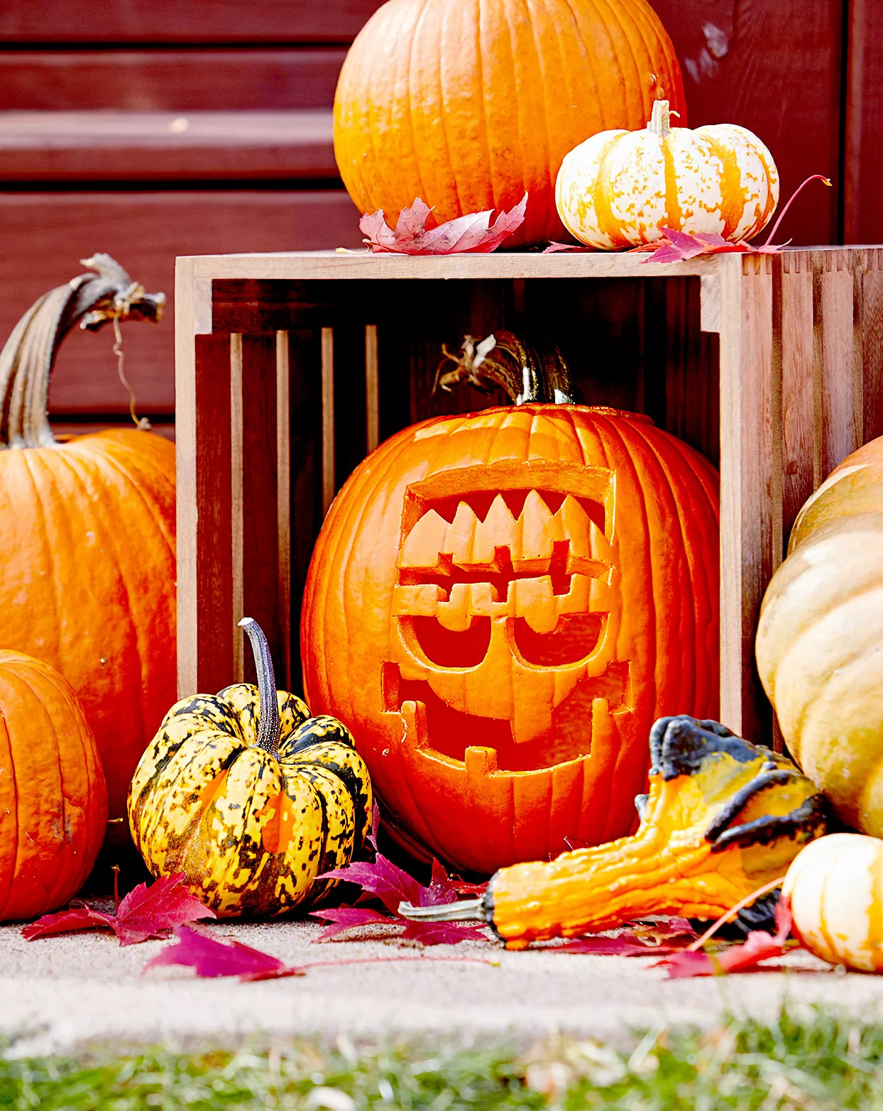 Fall décor with carved Frankenstein pumpkin