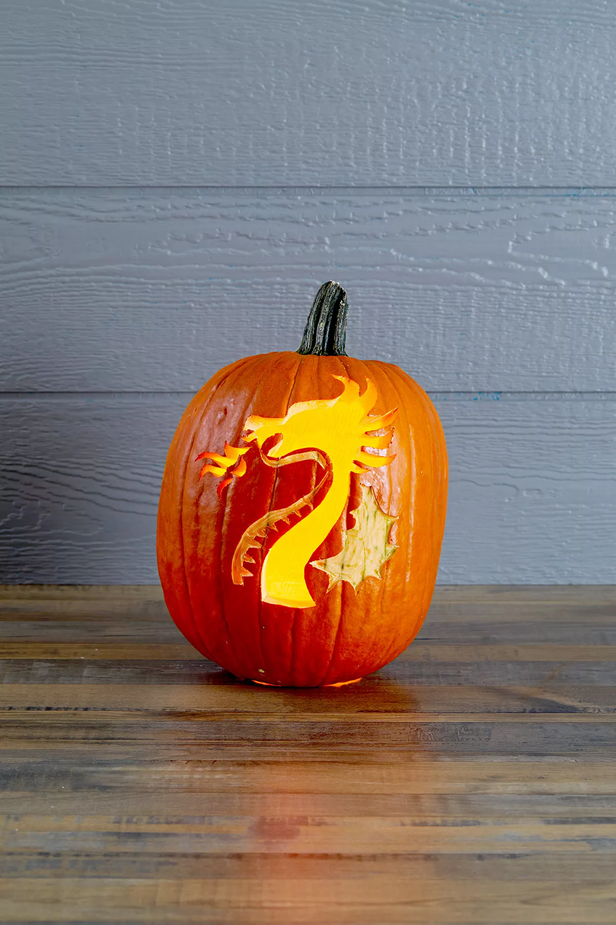 Pumpkin with dragon carving