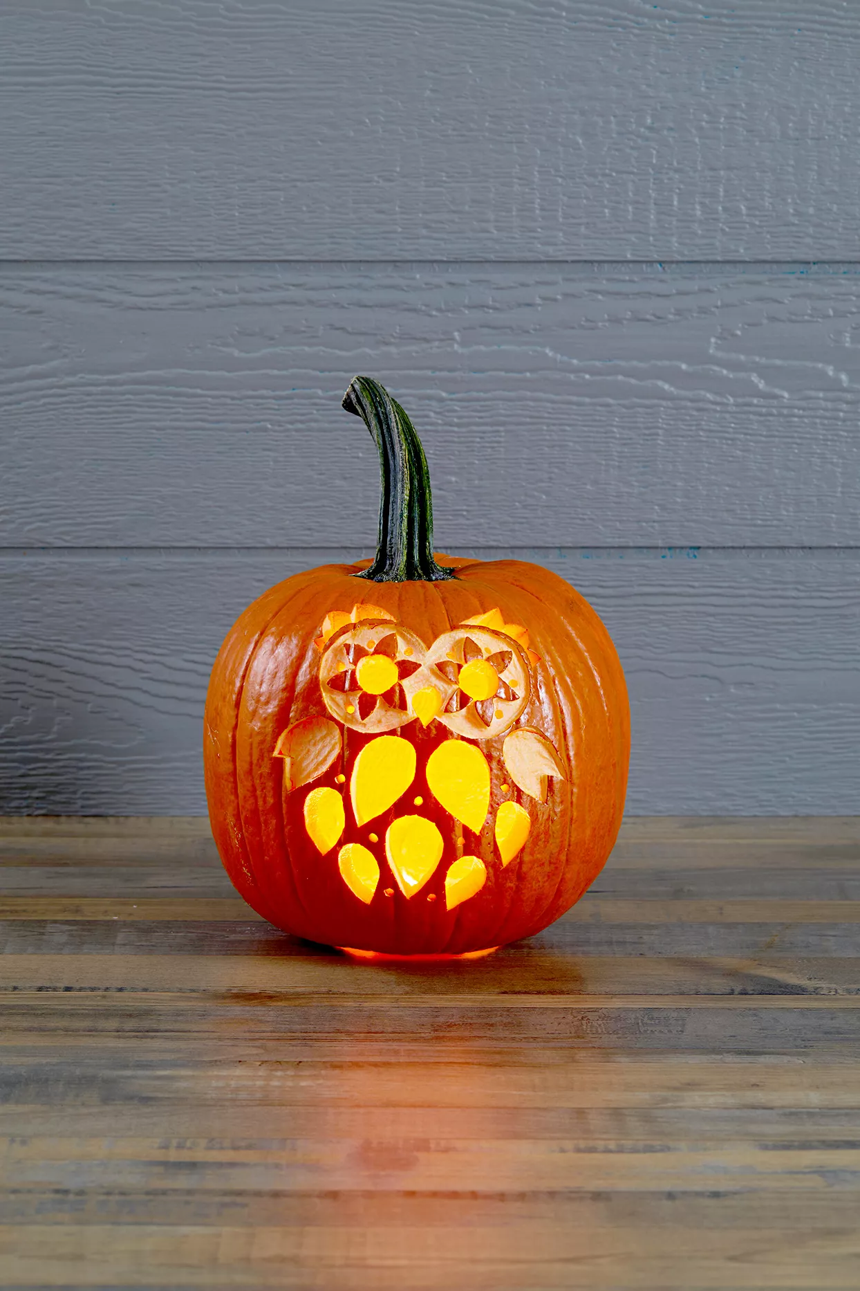 Pumpkin with owl carving