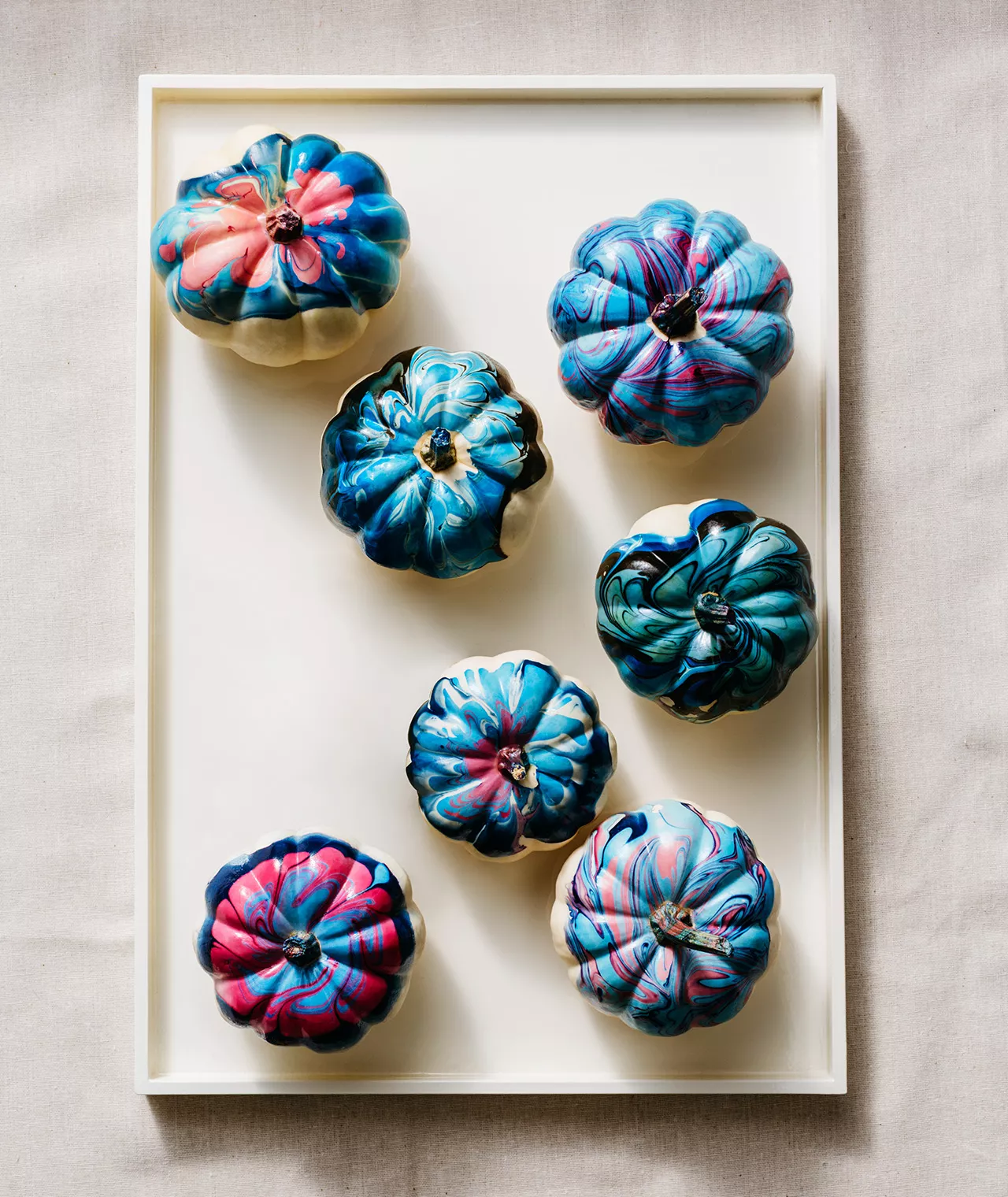 Top view of marble painted pumpkins
