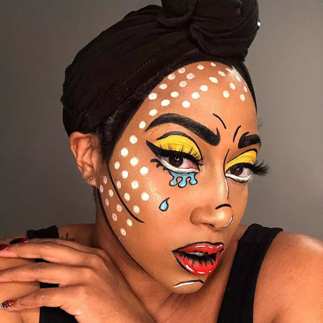 Makeup artist wears a Roy Lichtenstein-inspired colorful comic book makeup look