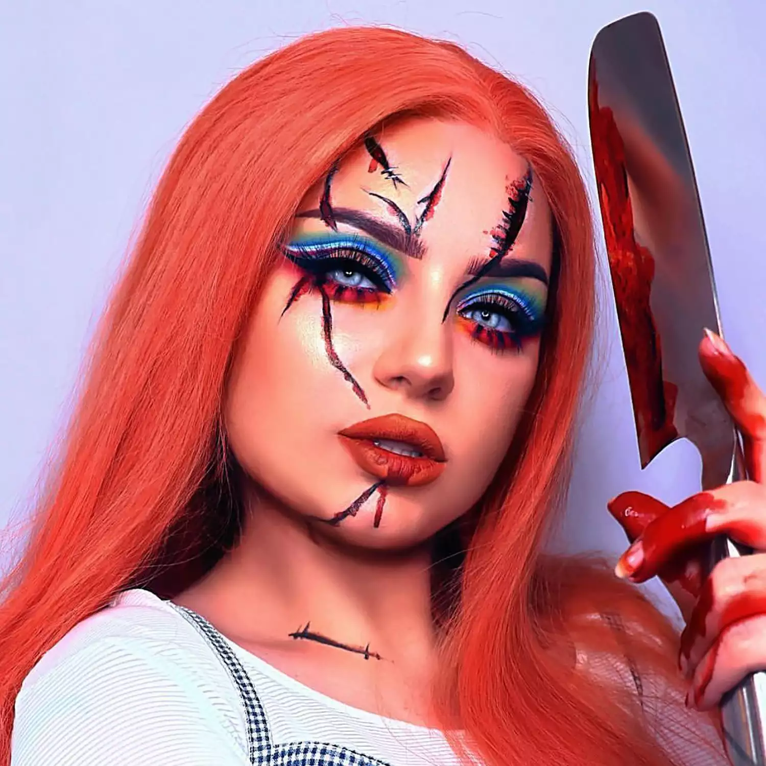Chucky Halloween makeup with cuts on face and fake blood