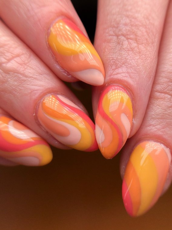 orange swirl almond nails