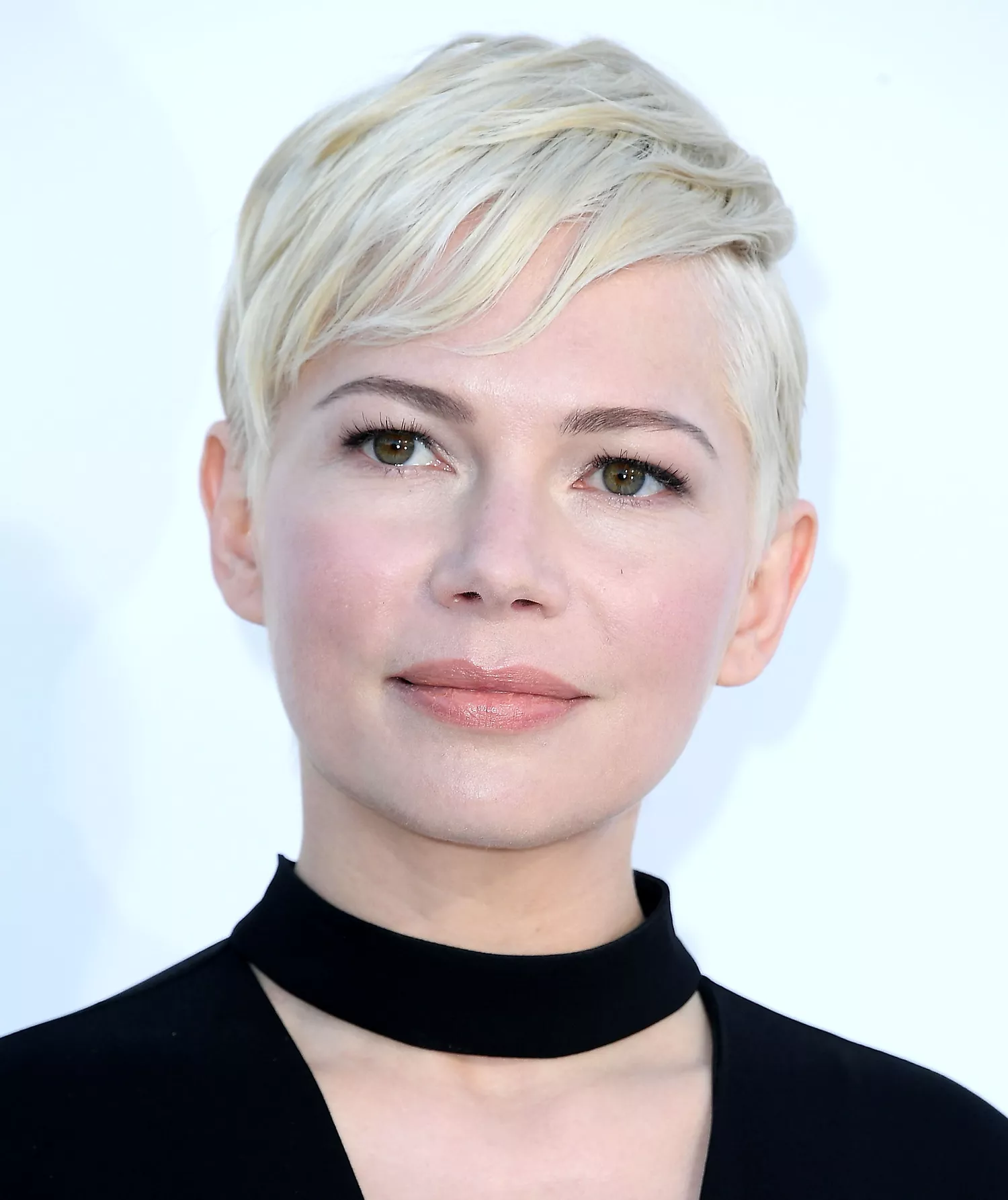 Michelle Williams with a Long Pixie Cut with sideswept bangs
