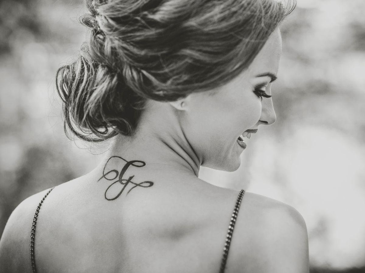 Name Initial Neck Tattoo