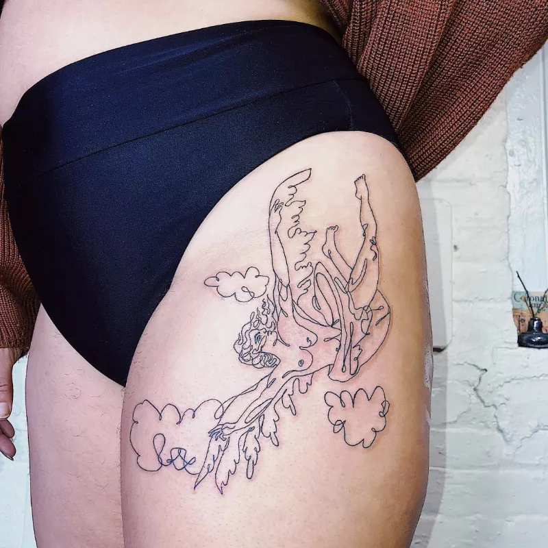 Clouds and abstract nude angel leg tattoo
