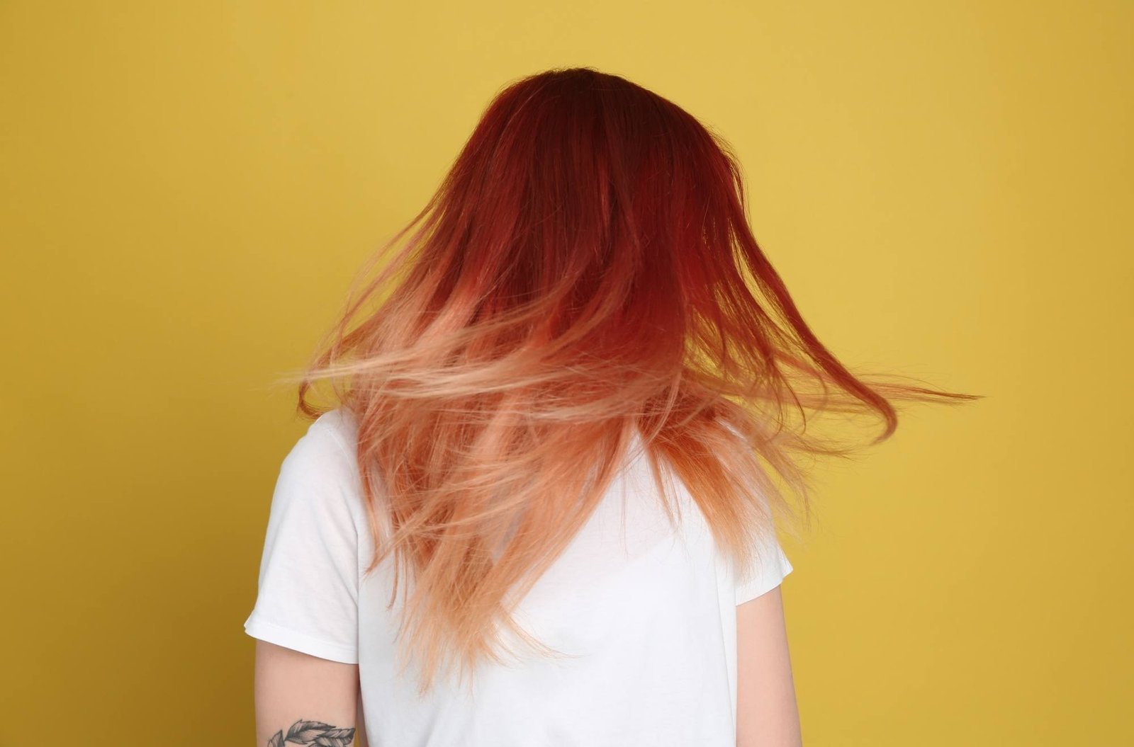 Woman with red ombre hair