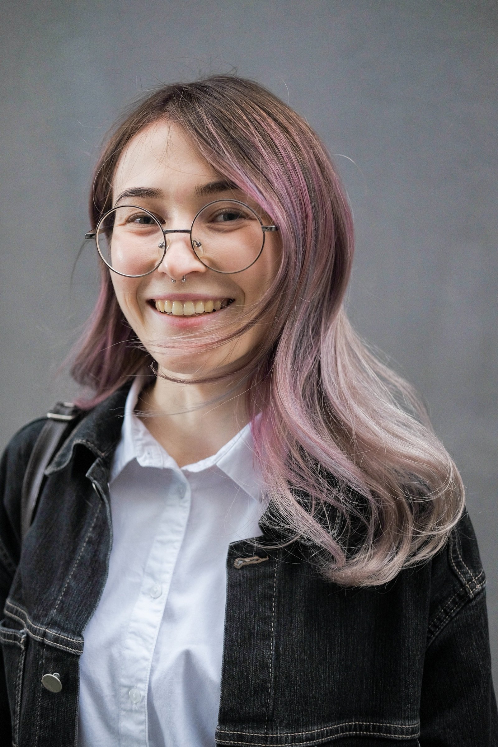 Asian woman with lilac and pink hair
