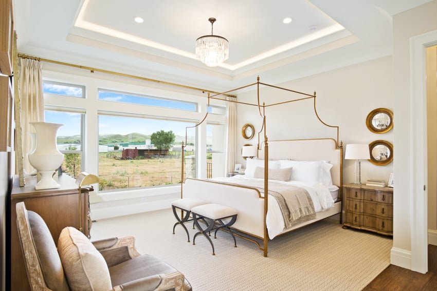 Contemporary bedroom with frame in gold and white wall