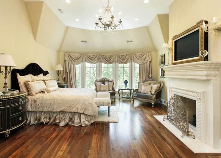 Primary bedroom with traditional style curtains with valance